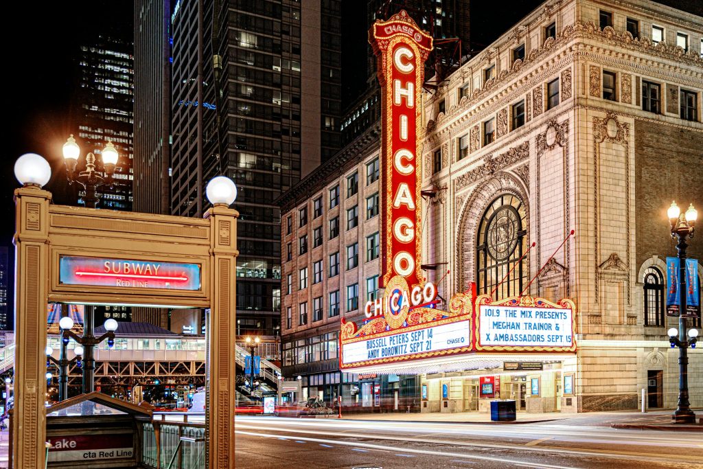 Chicago Theatre and CTA Red Line at night
