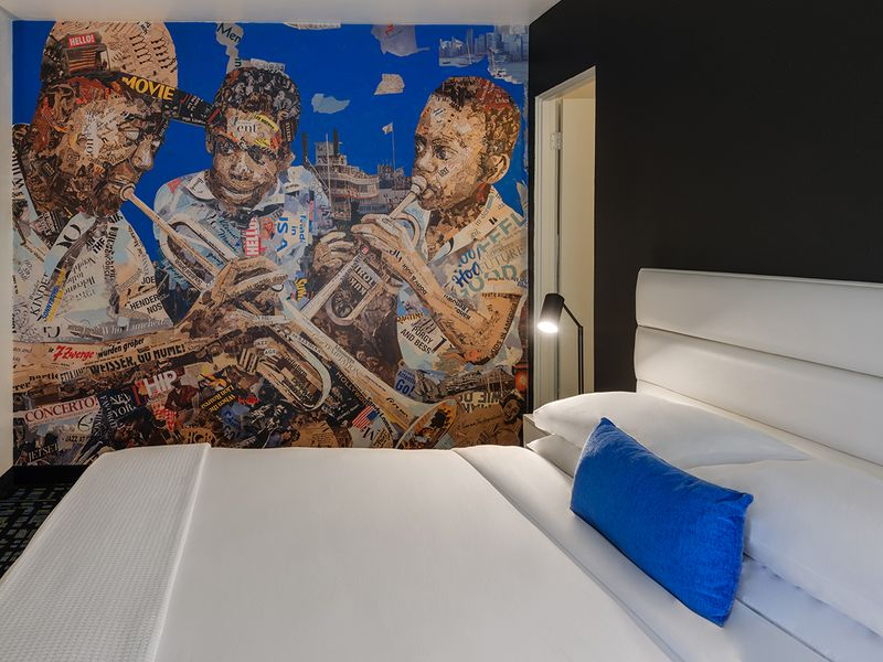 Jupiter Hotel room with music-inspired mural