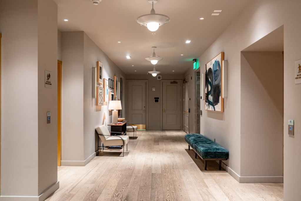Woodlark Hotel corridor with curated artwork
